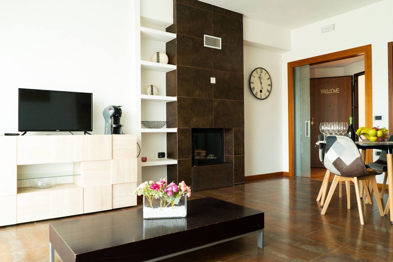 Incantevole attico con caminetto