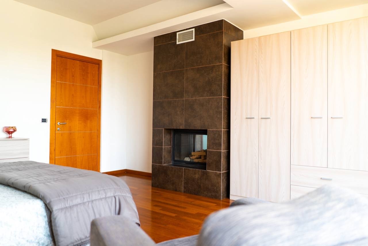 Incantevole attico con caminetto